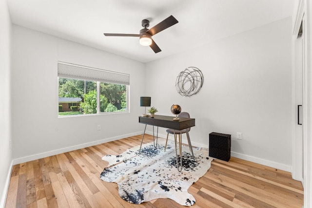5102 Ravensdale Ln, Austin, TX 78723 - office space featuring a ceiling fan, hardwood / wood-style floors, and baseboards