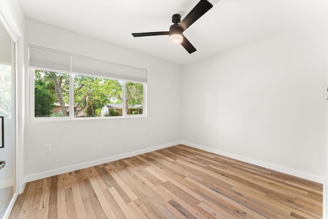 5102 Ravensdale Ln, Austin, TX 78723 - unfurnished room with light wood-style flooring, ceiling fan, and baseboards
