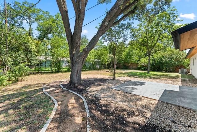 5102 Ravensdale Ln, Austin, TX 78723 - view of yard with central AC and a patio