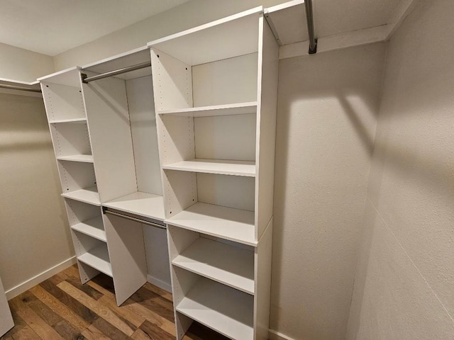 5102 Ravensdale Ln, Austin, TX 78723 - spacious closet featuring wood finished floors