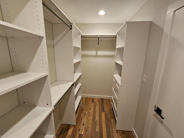 5102 Ravensdale Ln, Austin, TX 78723 - spacious closet featuring dark wood finished floors