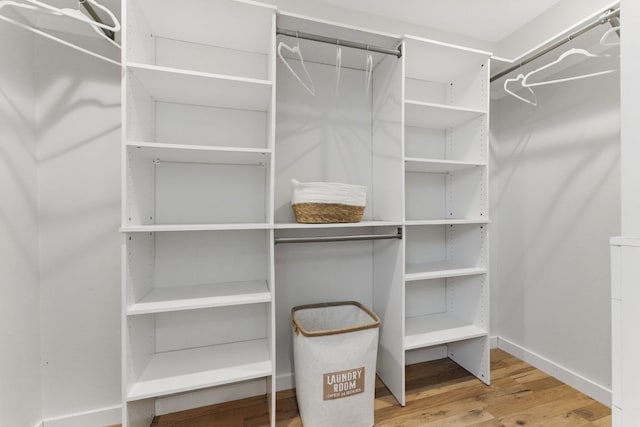 5102 Ravensdale Ln, Austin, TX 78723 - spacious closet featuring wood finished floors