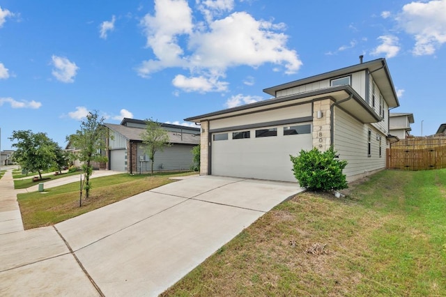 7809 Linnie Ln, Austin, TX 78724 - view of front of property with an attached garage and driveway