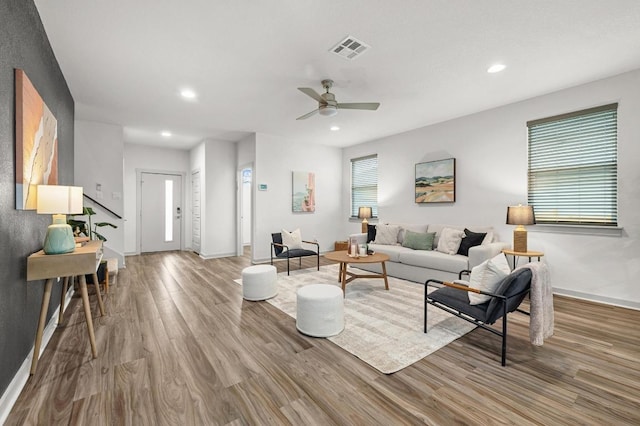 7809 Linnie Ln, Austin, TX 78724 - living room with wood finished floors, ceiling fan, and recessed lighting