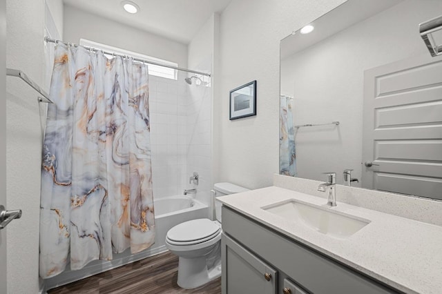 7809 Linnie Ln, Austin, TX 78724 - bathroom with vanity, wood finished floors, shower / tub combo, and recessed lighting