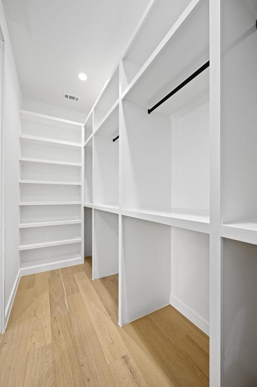 3507 Neal St Unit 1, Austin, TX 78702 - walk in closet with wood finished floors