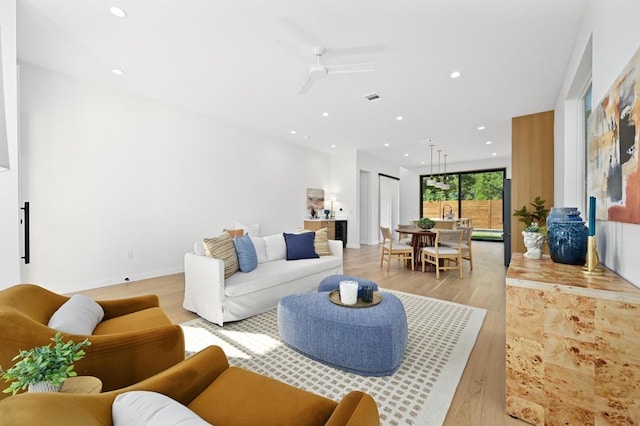 3507 Neal St Unit 1, Austin, TX 78702 - living room with light wood finished floors, recessed lighting, and ceiling fan