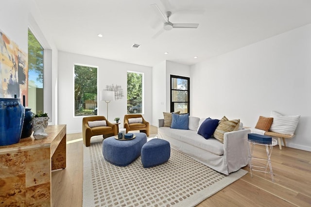 3507 Neal St Unit 1, Austin, TX 78702 - living area featuring wood finished floors, recessed lighting, a ceiling fan, and baseboards