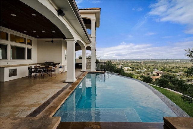 111 Piazza Vetta Dr, Austin, TX 78734 - view of pool with a ceiling fan, a patio area, an infinity pool, and outdoor dining space