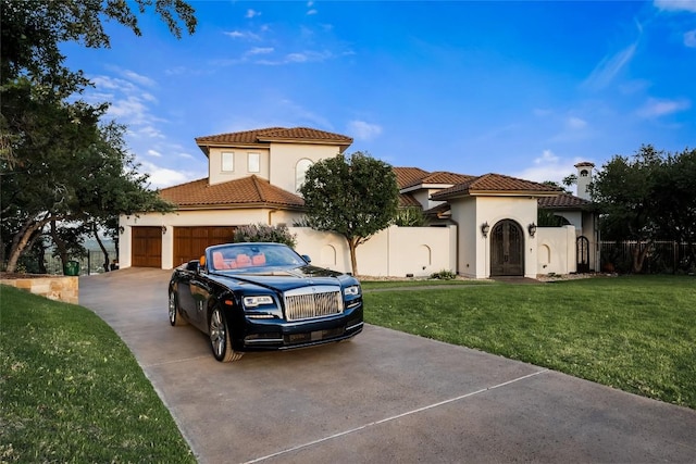 111 Piazza Vetta Dr, Austin, TX 78734 - mediterranean / spanish home featuring concrete driveway, a garage, stucco siding, and a tile roof