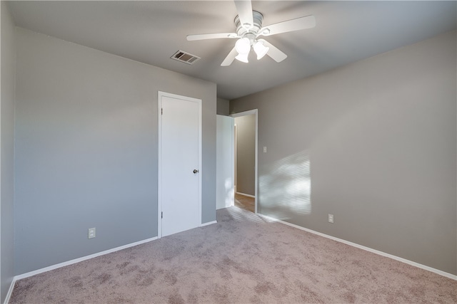 4303 Tamarack Trl, Austin, TX 78727 - carpeted empty room featuring a ceiling fan and baseboards