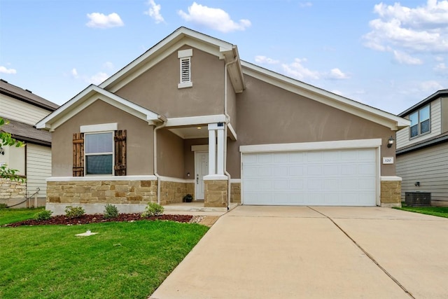120 Flexus Ln, Liberty Hill, TX 78642 - view of front of property with concrete driveway, stucco siding, an attached garage, and a front lawn