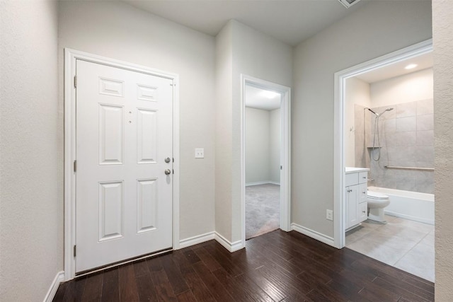 120 Flexus Ln, Liberty Hill, TX 78642 - entryway featuring wood finished floors and baseboards