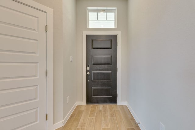 110 Denali Dr, Kyle, TX 78640 - entryway with light wood finished floors and baseboards