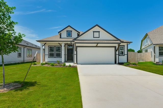 110 Denali Dr, Kyle, TX 78640 - view of front of house featuring an attached garage, concrete driveway, and a shingled roof