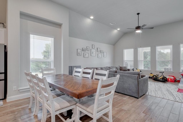 441 Double Eagle Ranch Dr, Cedar Creek, TX 78612 - dining area with light wood-style floors, healthy amount of natural light, ceiling fan, lofted ceiling, and recessed lighting