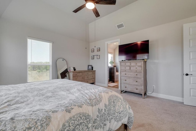 441 Double Eagle Ranch Dr, Cedar Creek, TX 78612 - bedroom featuring multiple windows, light carpet, ceiling fan, and high vaulted ceiling