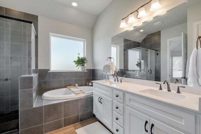 441 Double Eagle Ranch Dr, Cedar Creek, TX 78612 - full bath featuring a shower stall, double vanity, a bath, and plenty of natural light