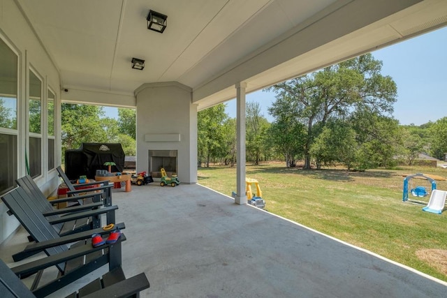 441 Double Eagle Ranch Dr, Cedar Creek, TX 78612 - view of patio with a large fireplace