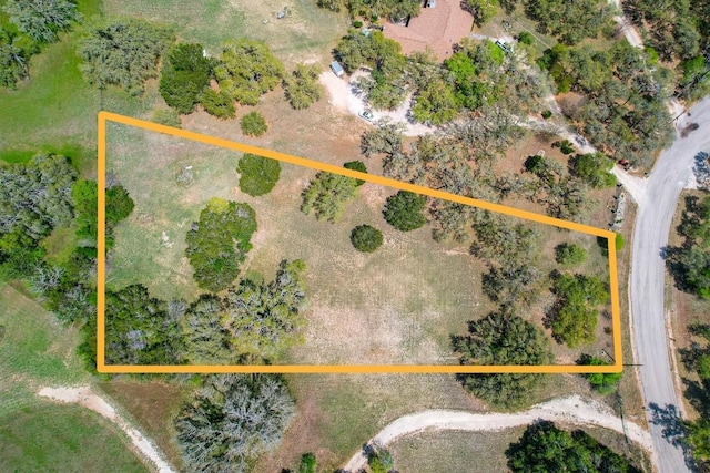 297 Carpers Trl, Fischer, TX 78623 - aerial view of property and surrounding area with property boundaries highlighted