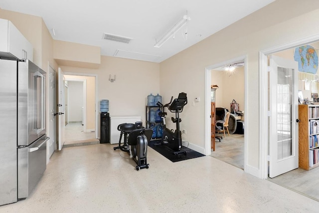 297 Carpers Trl, Fischer, TX 78623 - exercise area featuring french doors