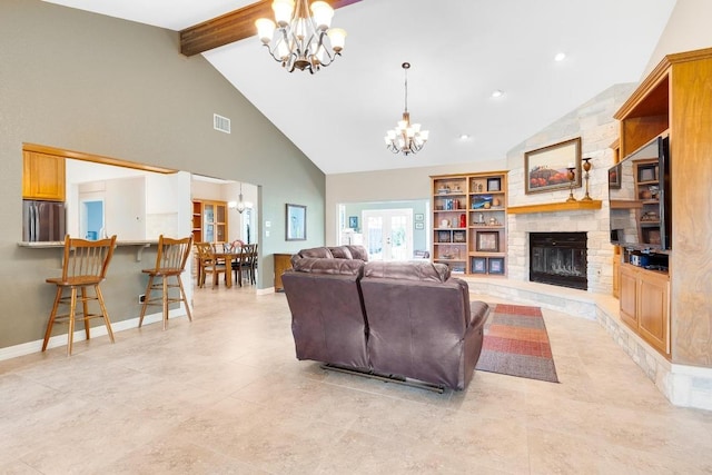 297 Carpers Trl, Fischer, TX 78623 - living area with a chandelier, high vaulted ceiling, beam ceiling, a stone fireplace, and baseboards