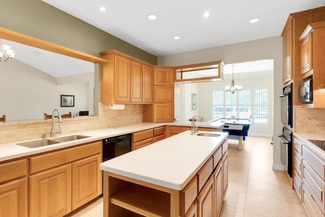 297 Carpers Trl, Fischer, TX 78623 - kitchen with a sink, oven, a chandelier, backsplash, and recessed lighting