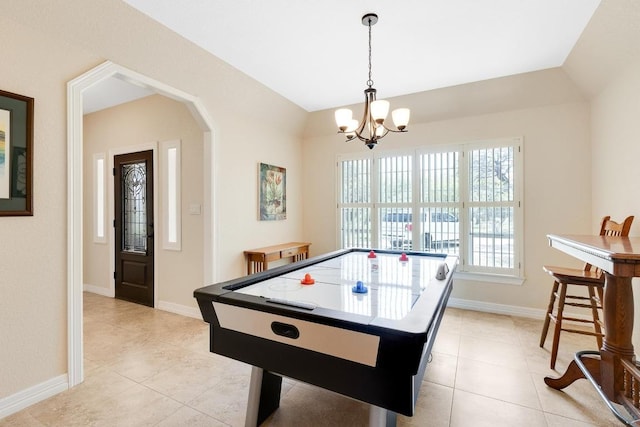 297 Carpers Trl, Fischer, TX 78623 - game room with light tile patterned flooring, a chandelier, arched walkways, and baseboards