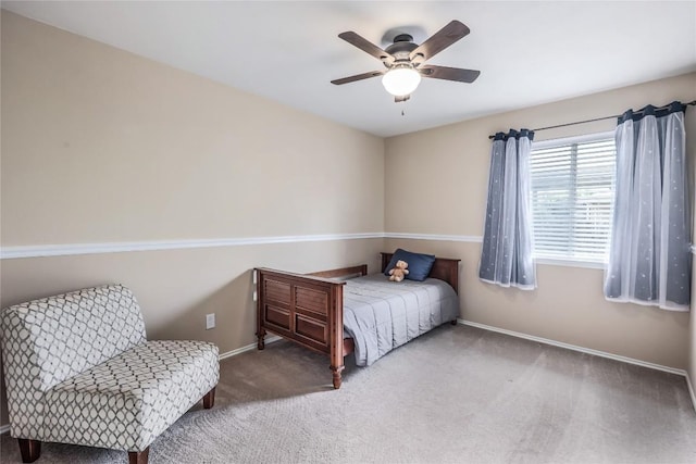 217 Baldwin St, Hutto, TX 78634 - bedroom featuring carpet, baseboards, and ceiling fan