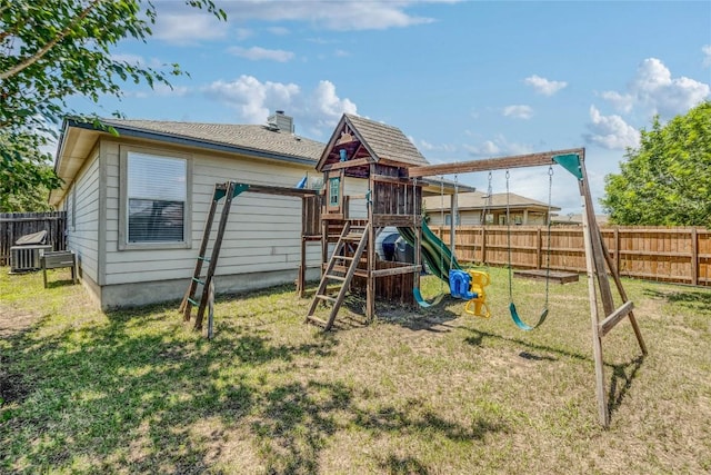 217 Baldwin St, Hutto, TX 78634 - view of jungle gym featuring central AC unit