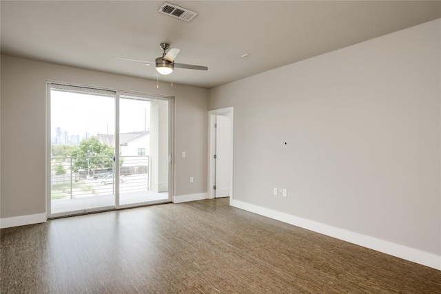 2724 Treble Ln Unit 324, Austin, TX 78704 - spare room featuring ceiling fan, baseboards, and wood finished floors