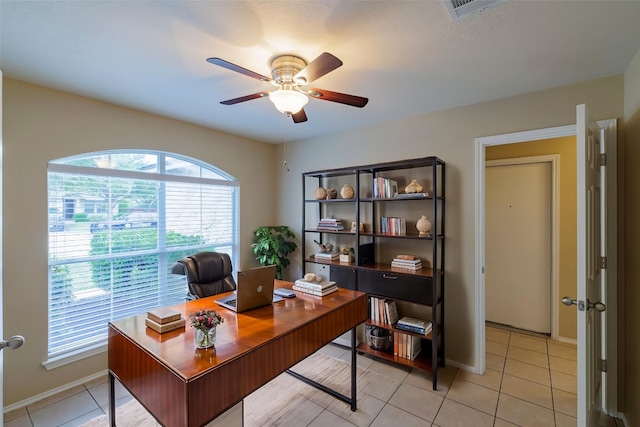1214 Hensley Dr, Leander, TX 78641 - office area with a ceiling fan, light tile patterned floors, and baseboards