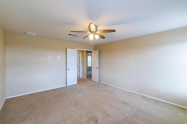 1214 Hensley Dr, Leander, TX 78641 - spare room with a ceiling fan, baseboards, and light colored carpet