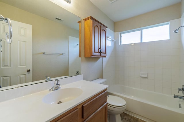 1214 Hensley Dr, Leander, TX 78641 - bathroom with vanity, toilet, and washtub / shower combination