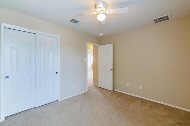 1214 Hensley Dr, Leander, TX 78641 - unfurnished bedroom with carpet, baseboards, a closet, and ceiling fan