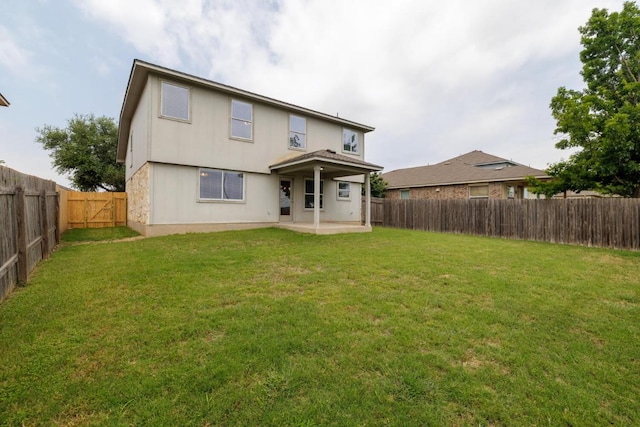 1214 Hensley Dr, Leander, TX 78641 - rear view of house with a patio area