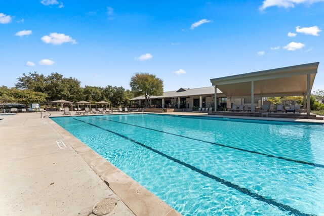 4162 Kingsley Ave, Round Rock, TX 78681 - community pool featuring a patio