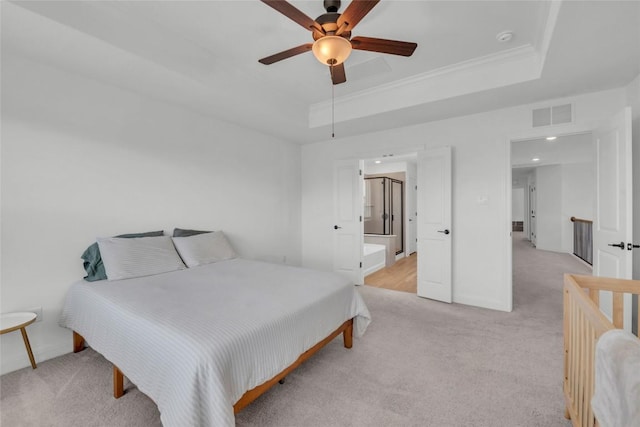 240 Harbors Ln, Leander, TX 78641 - bedroom with a tray ceiling, light carpet, baseboards, ornamental molding, and recessed lighting