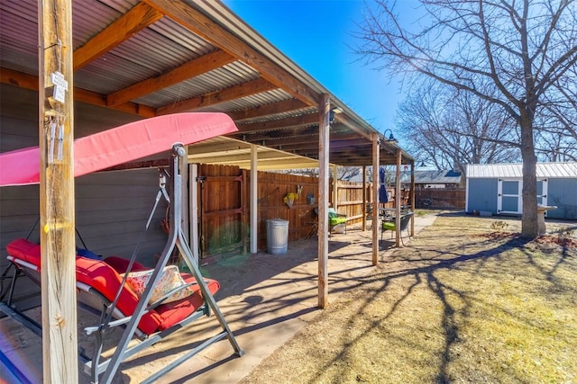 110 N Willis St, Lampasas, TX 76550 - view of patio / terrace featuring an outbuilding