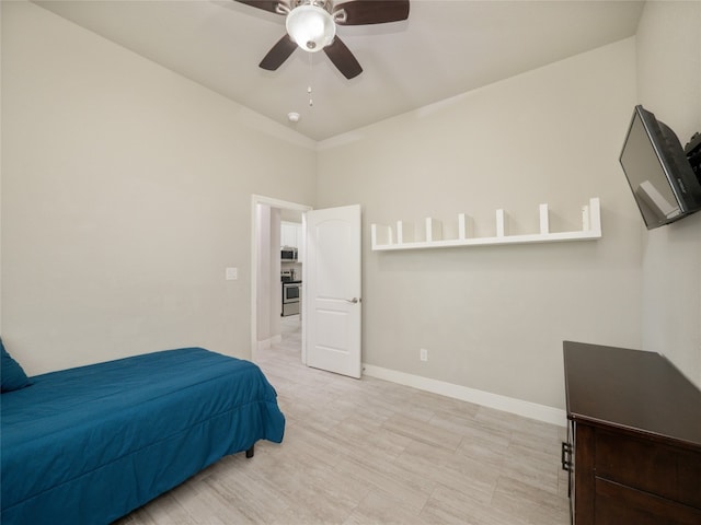 128 Naalehu Ct, Bastrop, TX 78602 - bedroom featuring ceiling fan and baseboards