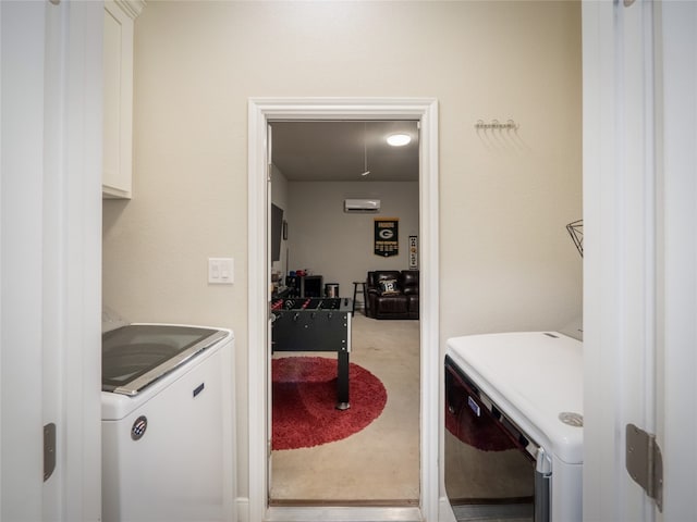 128 Naalehu Ct, Bastrop, TX 78602 - laundry room featuring independent washer and dryer, an AC wall unit, and carpet flooring
