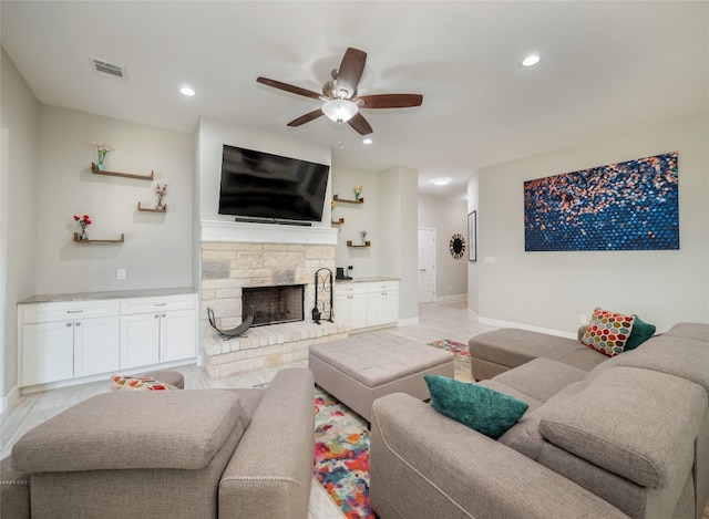 128 Naalehu Ct, Bastrop, TX 78602 - living area with a ceiling fan, a fireplace, recessed lighting, and baseboards
