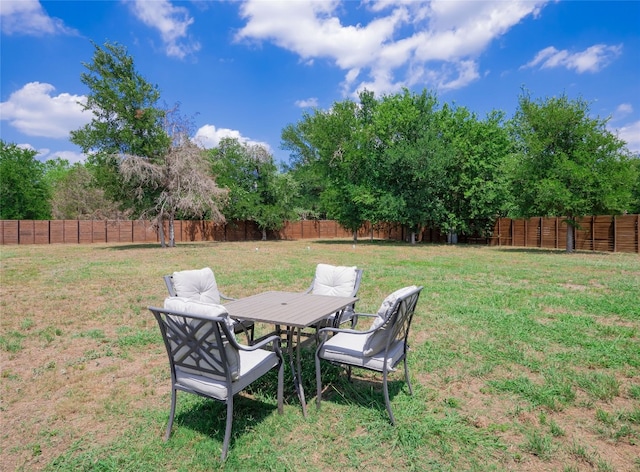 128 Naalehu Ct, Bastrop, TX 78602 - view of yard with outdoor dining space