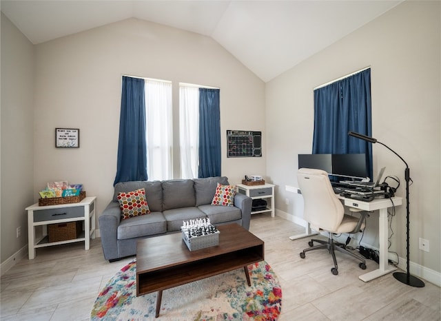 128 Naalehu Ct, Bastrop, TX 78602 - office featuring a wall unit AC, lofted ceiling, and baseboards