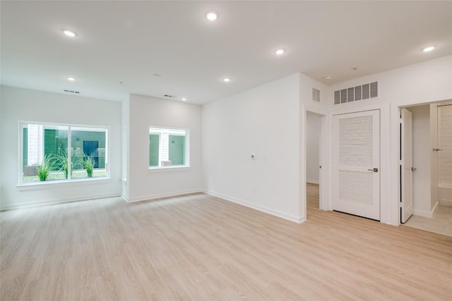 4802 S Congress Ave Unit 121, Austin, TX 78745 - empty room with light wood-type flooring and recessed lighting