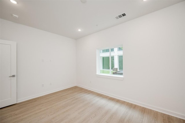 4802 S Congress Ave Unit 121, Austin, TX 78745 - empty room featuring light wood-style floors and recessed lighting