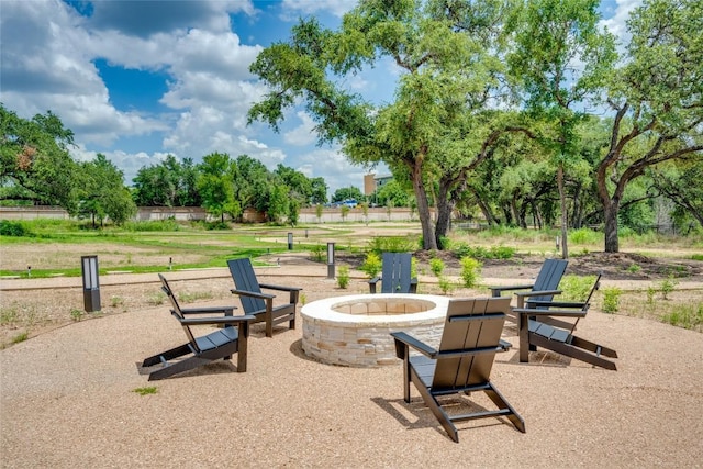 4802 S Congress Ave Unit 121, Austin, TX 78745 - view of patio / terrace featuring a fire pit