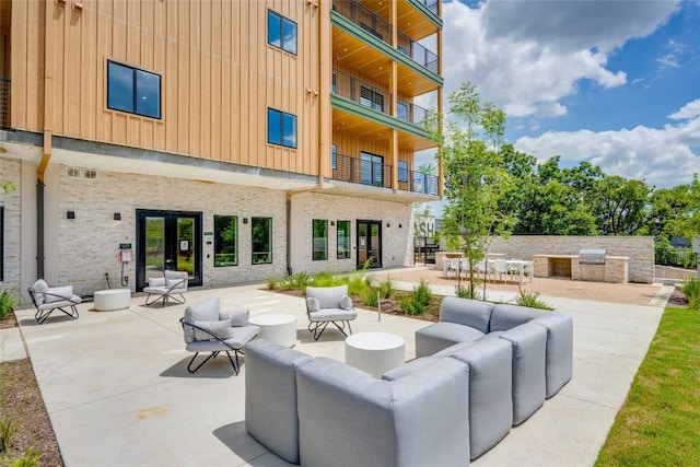 4802 S Congress Ave Unit 121, Austin, TX 78745 - patio / terrace with outdoor lounge area, a patio, and area for grilling