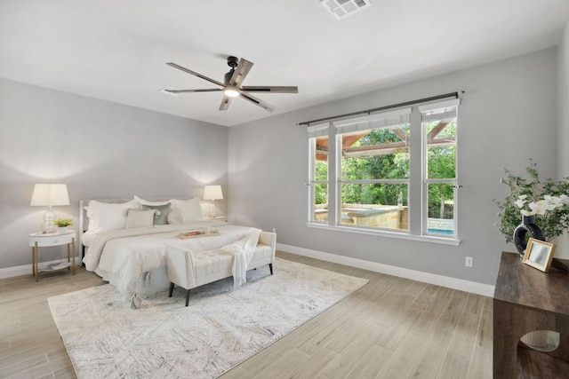 7820 Oteka Cv, Austin, TX 78735 - bedroom featuring light wood finished floors and ceiling fan