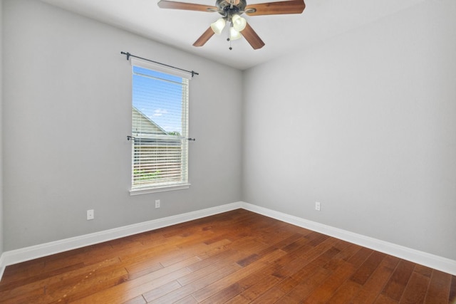 7820 Oteka Cv, Austin, TX 78735 - empty room with wood-type flooring, healthy amount of natural light, and baseboards